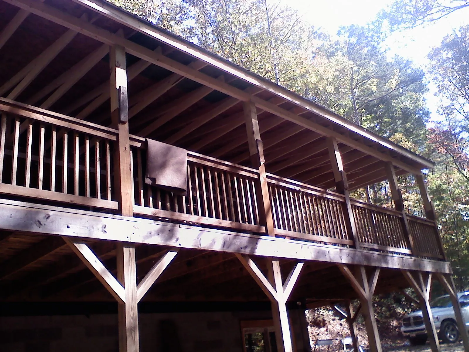 Timber framing under a new elevated porch and deck — Roof Leak Repair in Homer by Roofing Brothers